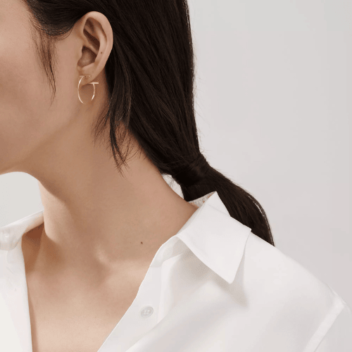 Sculpted Crossline Hoop Earrings Elevating Bold Minimal Aesthetic And Confident Presence