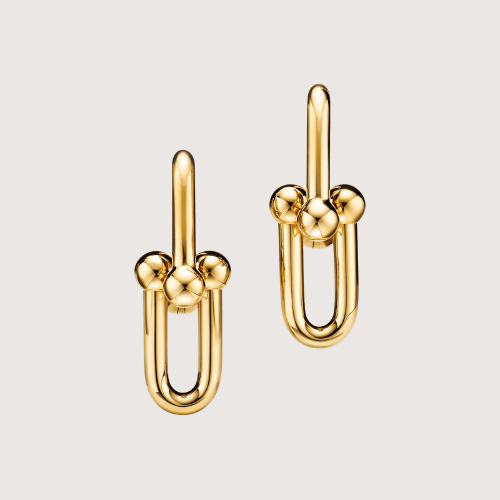 Playful Orbit Link Earrings Showcasing Bold Curves And Elevated Contemporary Character